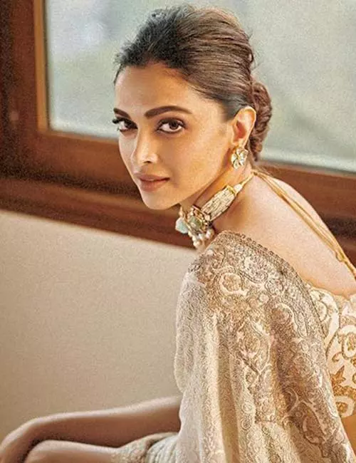 Deepika’s Puffy Semi-beehive Bun