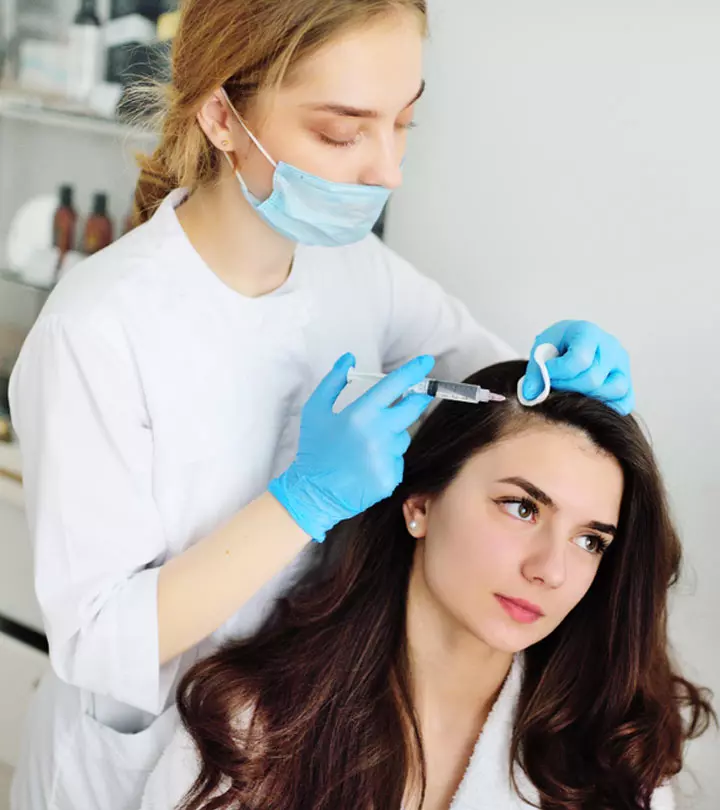 A woman having mesotherapy for hair growth