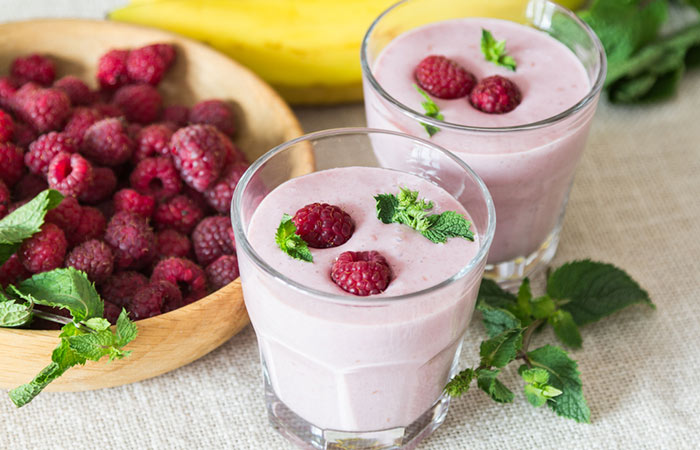 Biotin smoothie with banana, raspberry, and almond milk for boosting hair growth