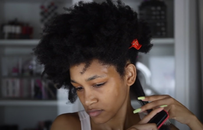 Comb your hair starting at the end and work your way up for perfect twist out on 4C natural hair