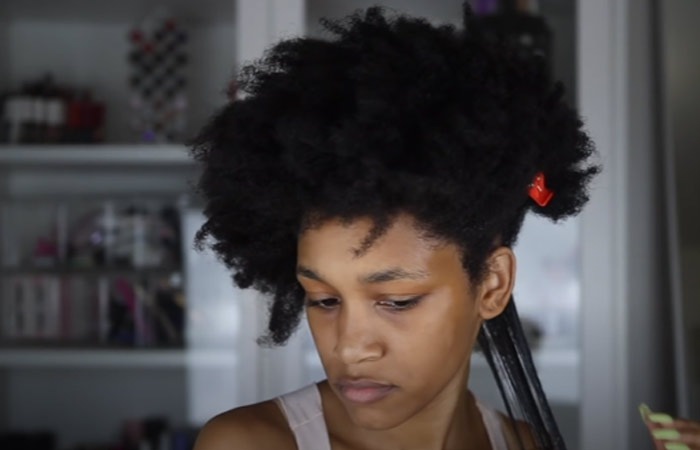 Apply shea butter or coconut oil for perfect twist out on 4C natural hair