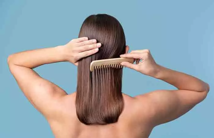 Use a wide-toothed comb to prevent hair loss in the shower