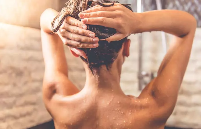 After washing your hair with shampoo, rinse your hair with ACV and massage your hair and scalp.