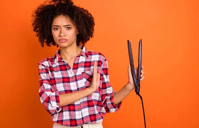 Woman avoiding hair straightening