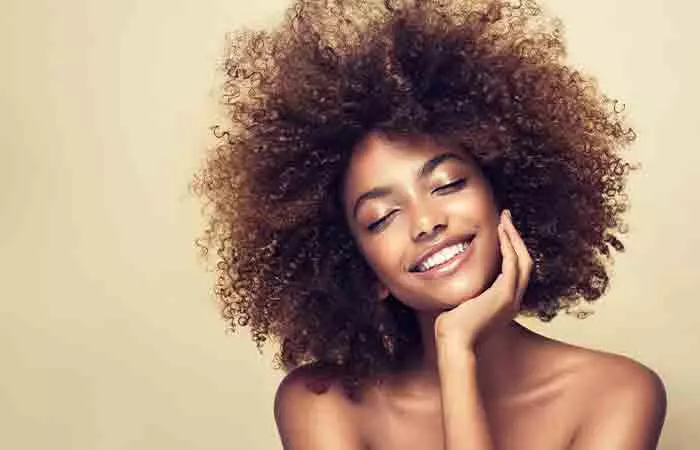 Black woman with healthy and beautiful curly hair