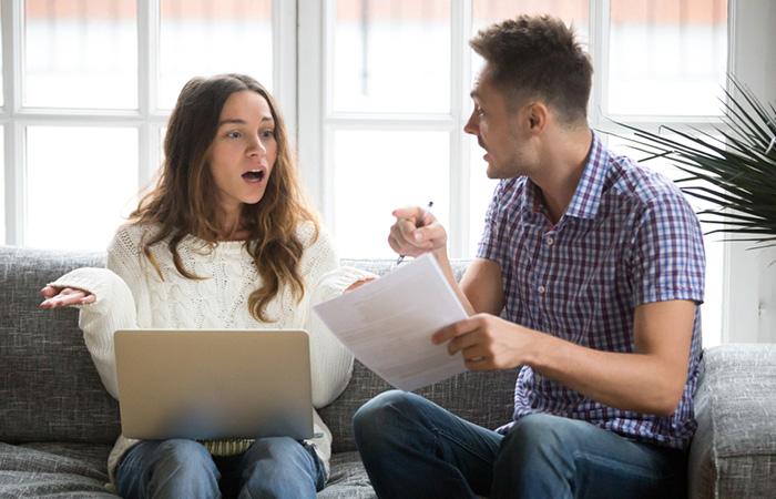 Couple arguing in exclusive relationship