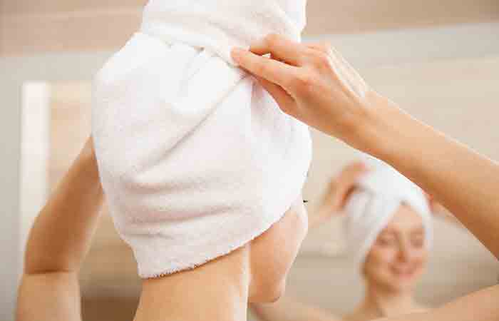 Wrap your hair in a towel after steaming it at home
