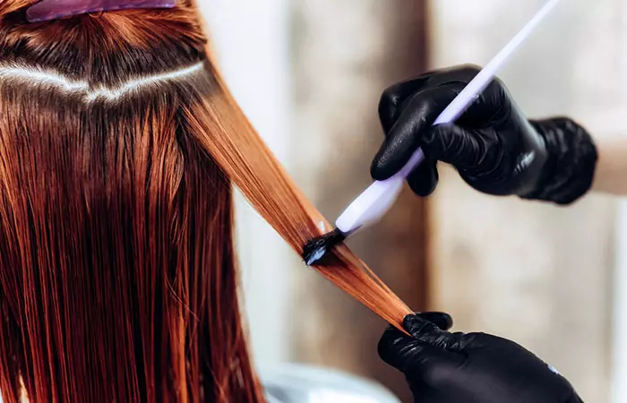 Hairdresser performing hair botox