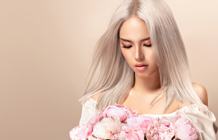 Young Asian woman with platinum blonde hair