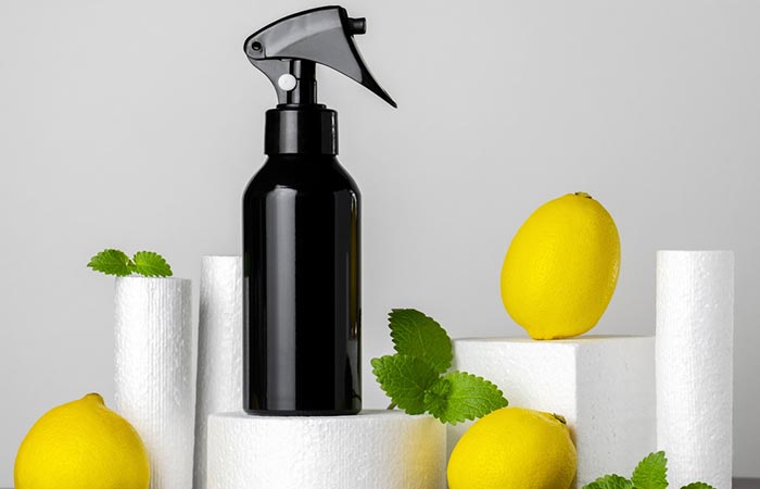 Lemon hair spray with isolated lemons