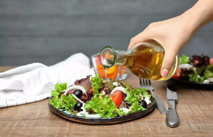 Add apple cider vinegar to salads and other food to make the most of its benefits