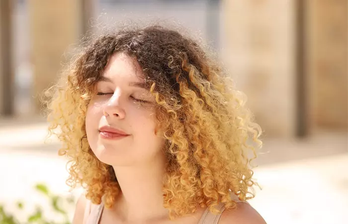 Woman enjoying natural sun bleaching hair