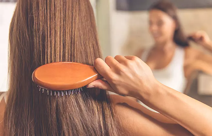 Woman brushing her hair