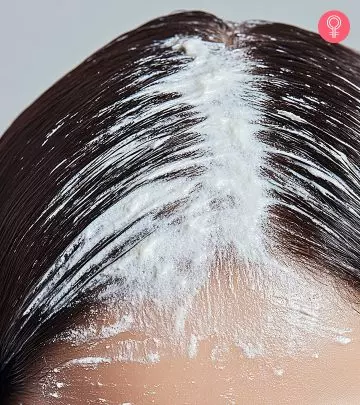 women applying Homemade scalp scrubs on her scalp