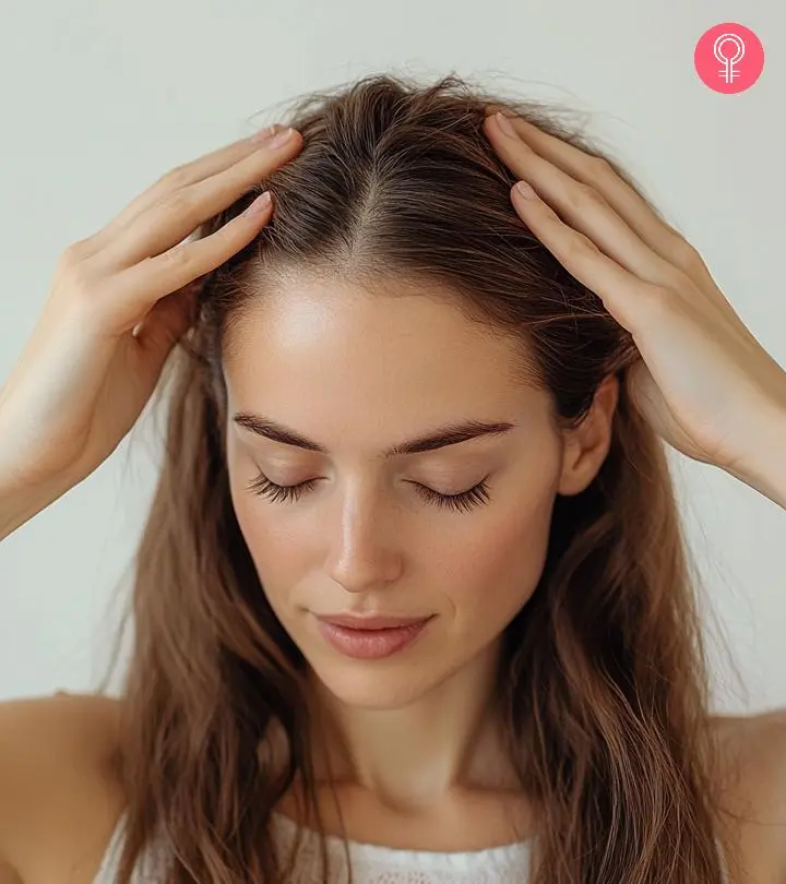 A Women Showing Acupressure Points For Hair Growth