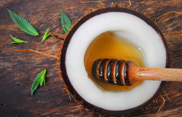 Honey filled inside a coconut.