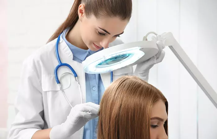 Woman consulting a doctor for hair loss