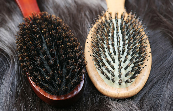 A pair of clean boar bristle brushes