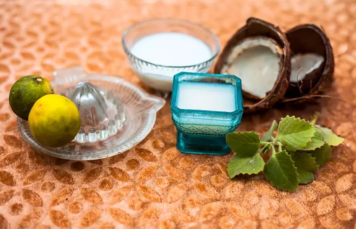 Bowls of coconut oil and lemon juice for gray hair mask