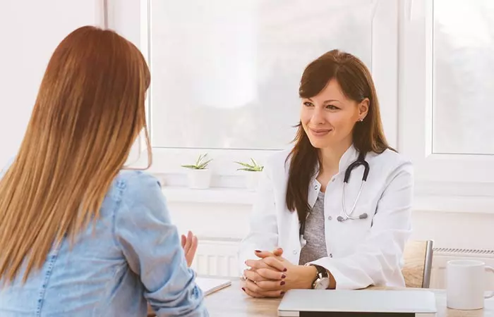 Woman consulting doctor's to know if silica consumption is safe.