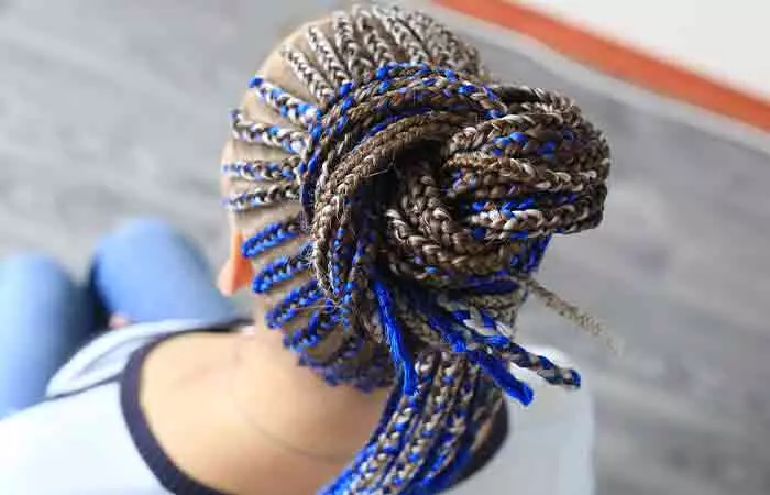 Closeup of a tightly done protective braid hairstyle that can lead to thinning edges