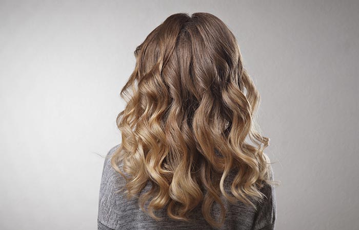 Woman with volume perm hair style.