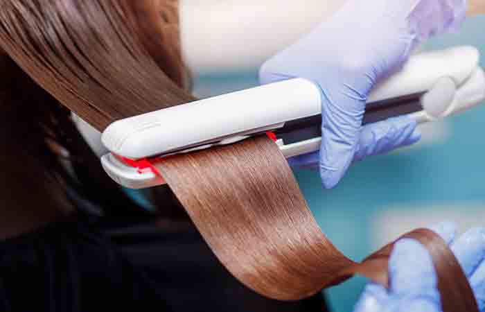 The Keratin Treatment uses a flat iron to smoothen out tresses