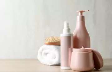 A spread of hair care products to use before coloring your hair