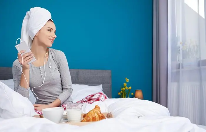 Woman with hair wrapped in a towel