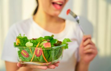 Woman having leafy greens for hair pigments