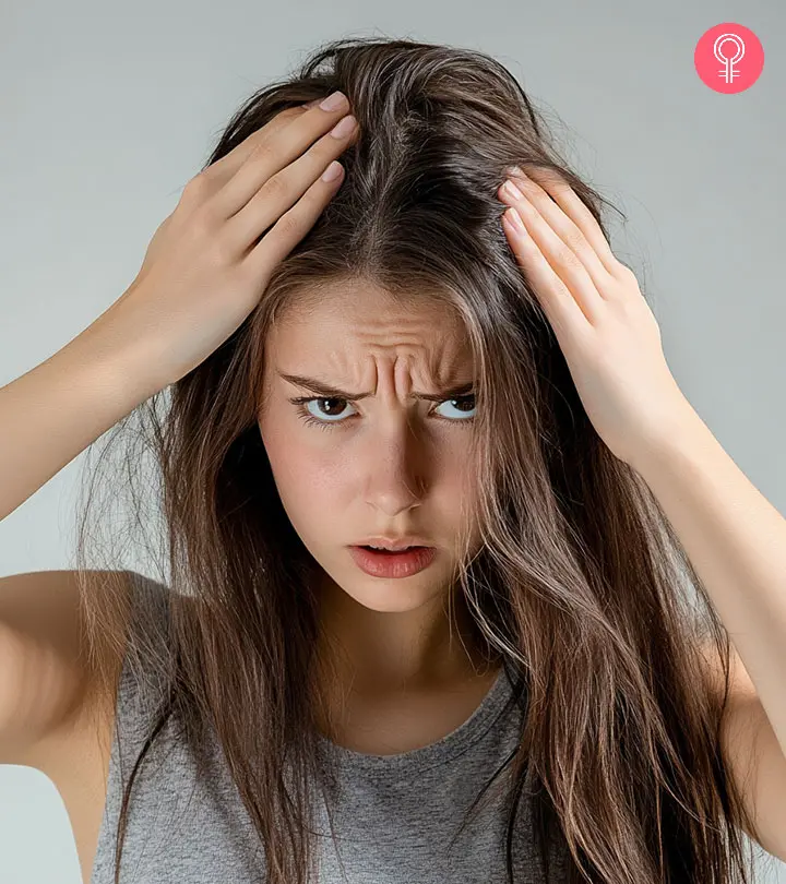 A Women With Symptoms Of Fleas In Hair