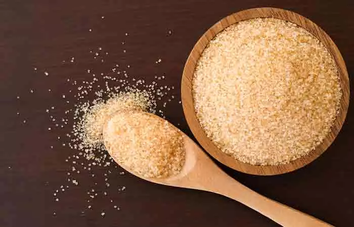 Bowl of brown sugar for exfoliating scalp