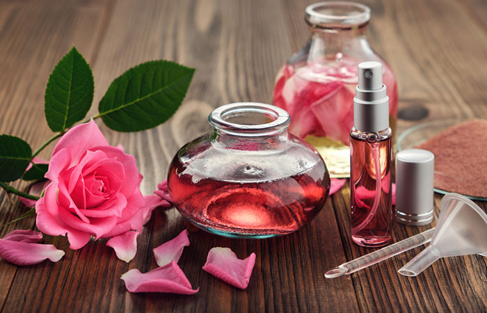 Rose water stored in spray bottle and bowl