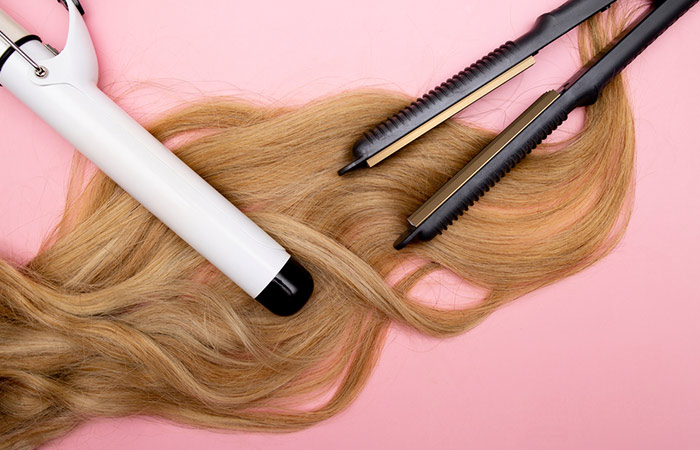 A curling iron and hair straightener