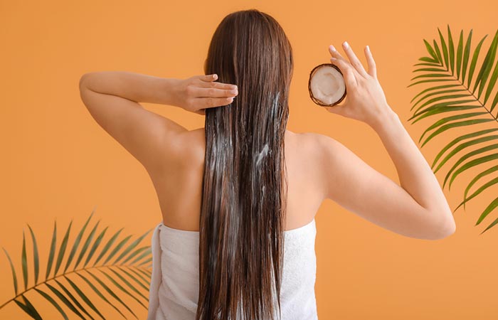 Massage your hair with coconut oil
