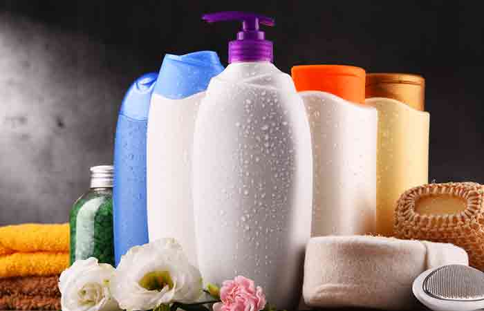 Different bottles of ketoconazole shampoos with other bathing tools