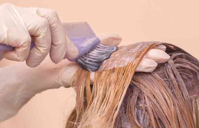 Woman getting semi-permanent hair dye