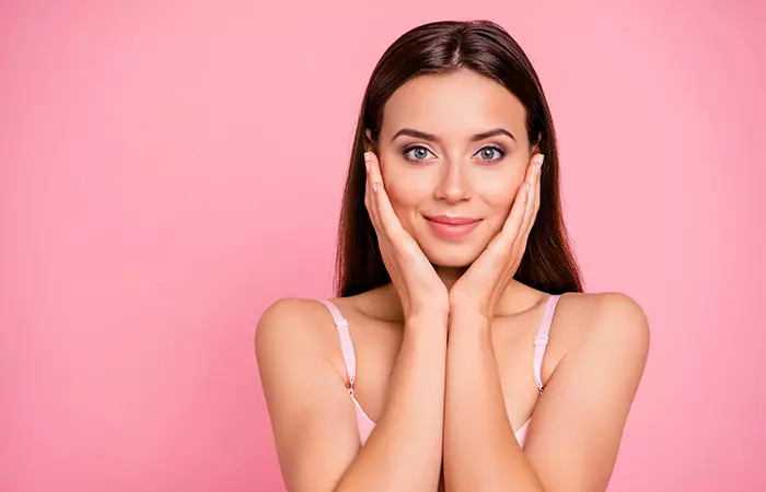 Woman feeling happy and good about her skin
