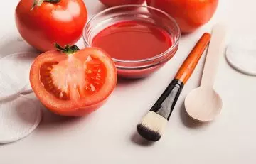 Tomato puree, makeup brush, and cotton pads