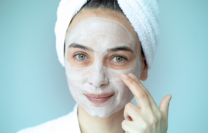 Woman with beneficial baking soda mask to detoxify the skin