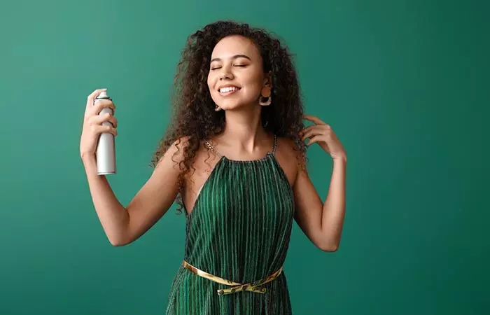 Woman hydrating her permed hair