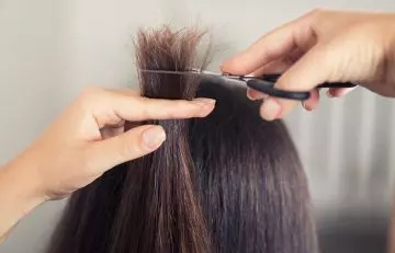 Hair trimming helps manage heat-damaged hair