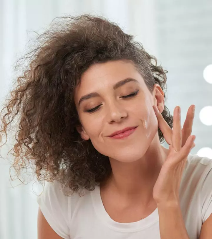 Woman Applying Alpha Lipoic Acid For Skin