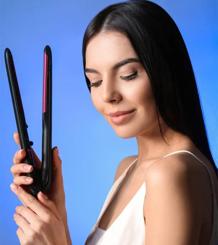 Women Cleaning A Flat Iron