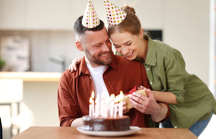 Woman celebrating her husband's birthday