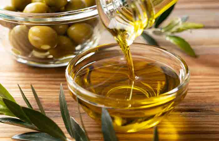 Bottle of olive oil for moisturizing hair