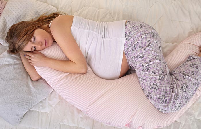 A pregnant woman sleeping peacefully