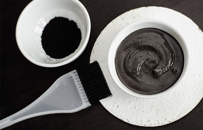 Charcoal face mask in a bowl