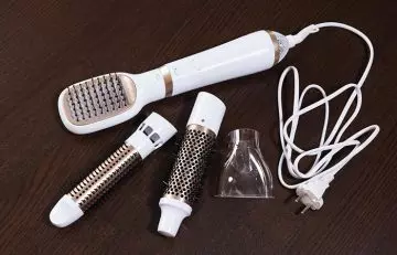 Hair straightening brush system with different brush attachments
