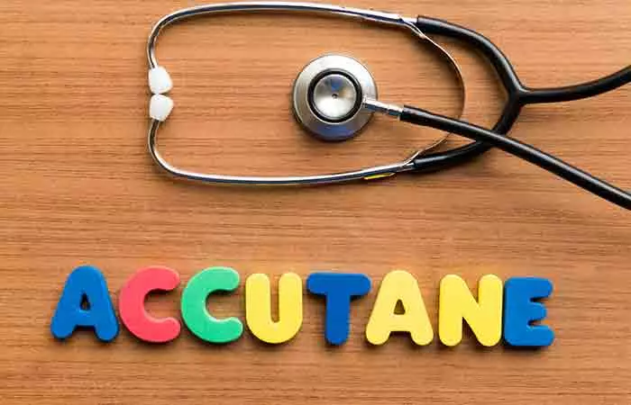 Stethoscope and accutane spelled with colorful letters on the table